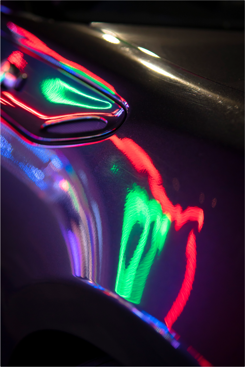 Green and red light reflecting neon lights.